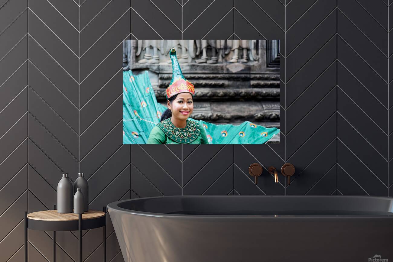 Smiling Cambodian dancer in traditional peacock costume at templ Reproduction