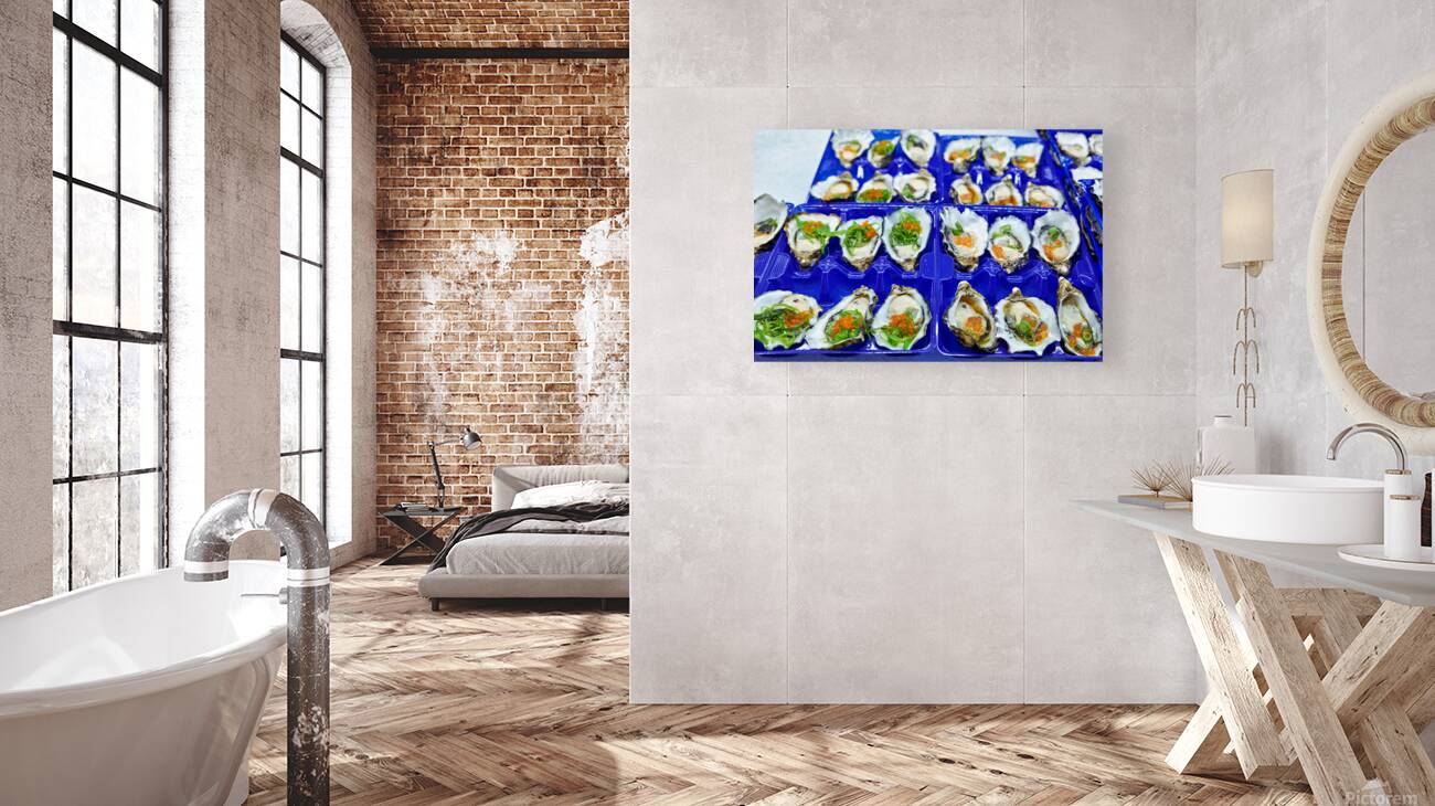 Fresh oysters with garnishes in blue trays. Reproduction