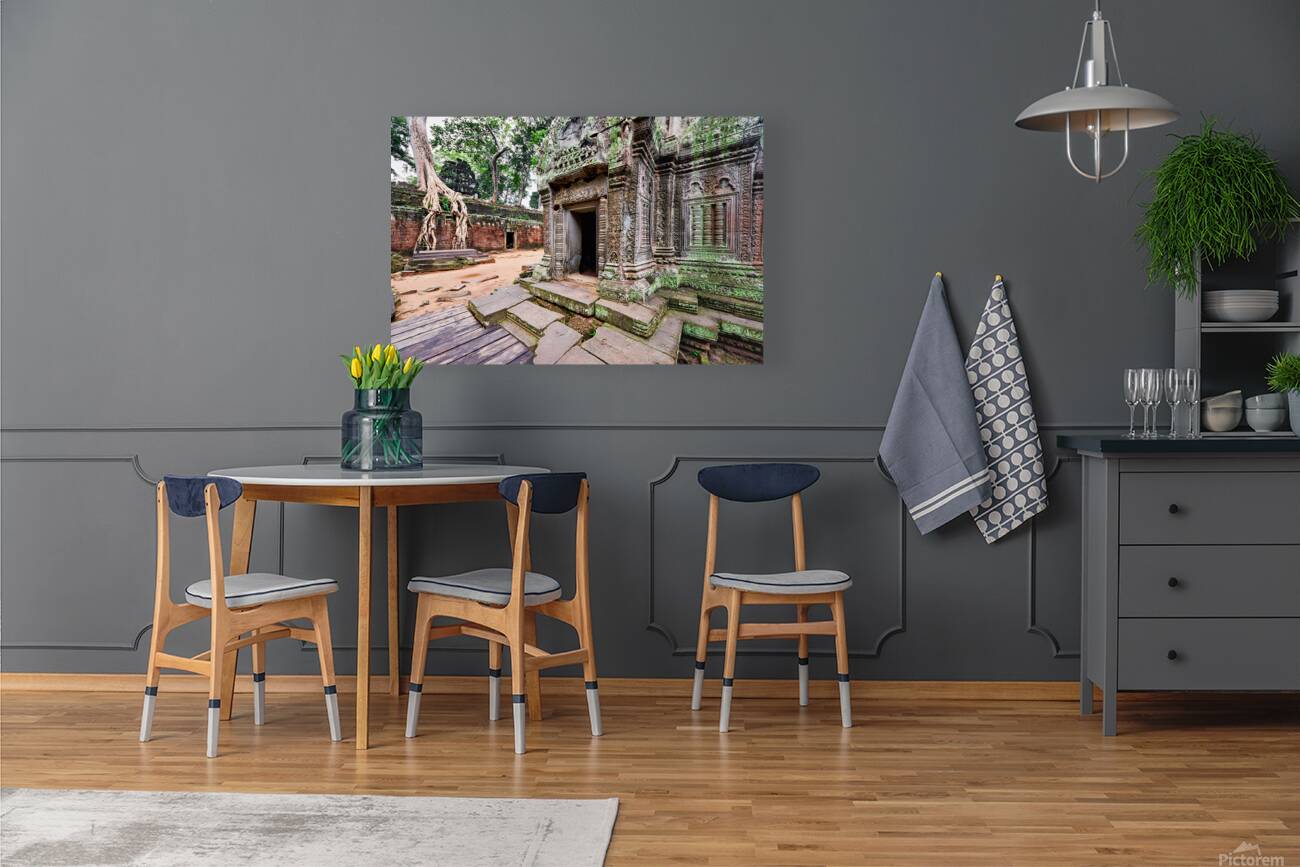 Angkor temple ruins consumed by nature. Reproduction