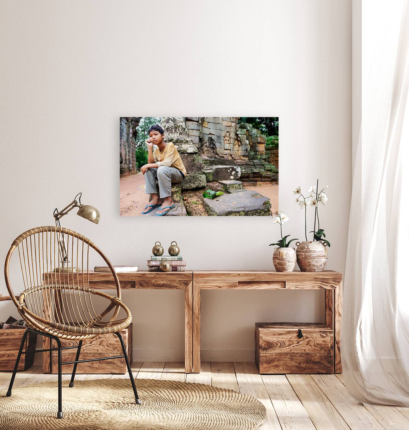 Young person sits on ancient temple ruins. Reproduction
