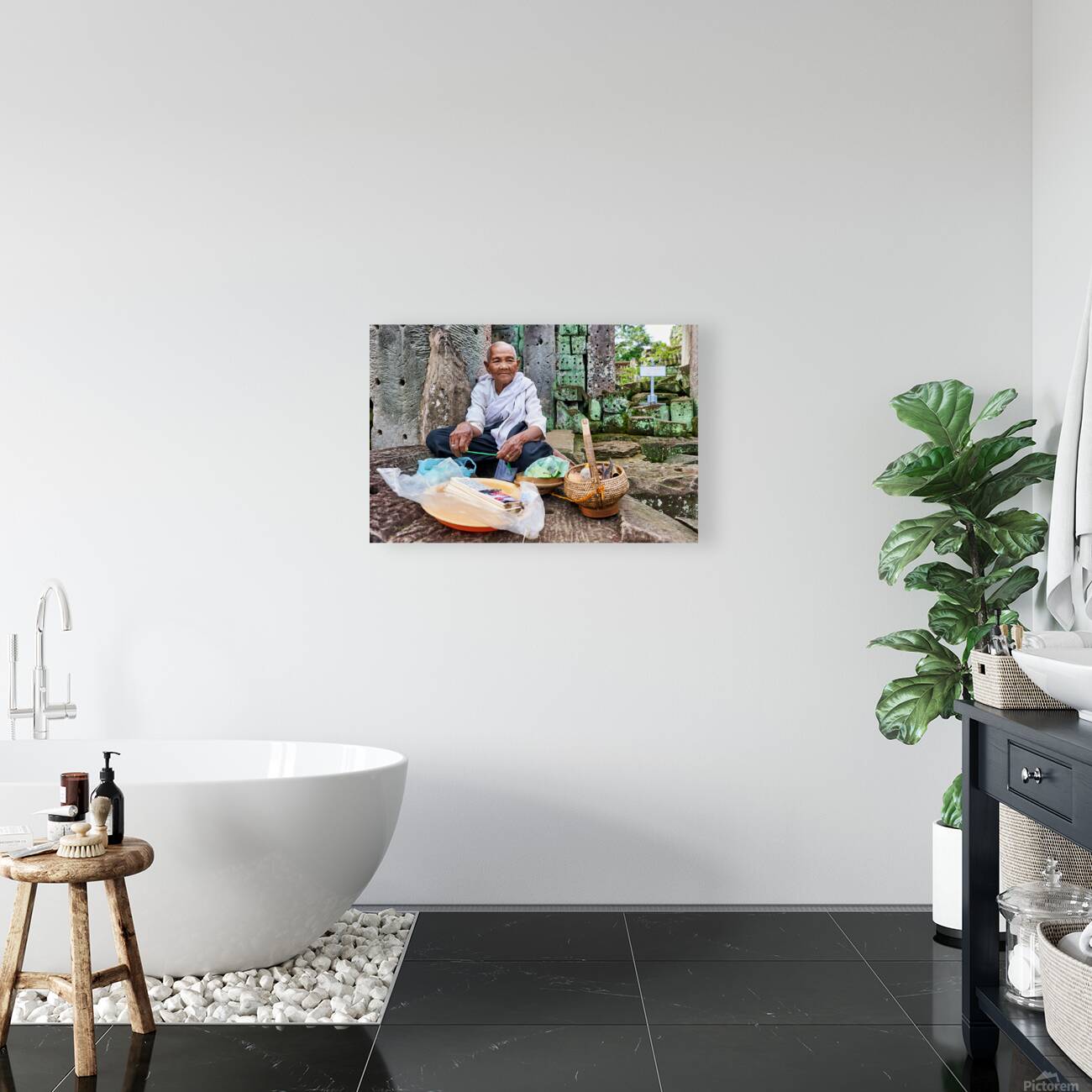 Elderly person selling goods at ancient temple ruins. Reproduction