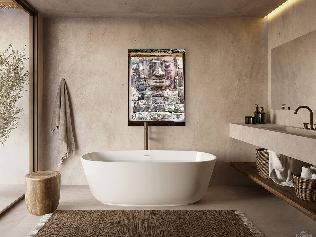 Ancient stone face carving framed in temple window. Reproduction