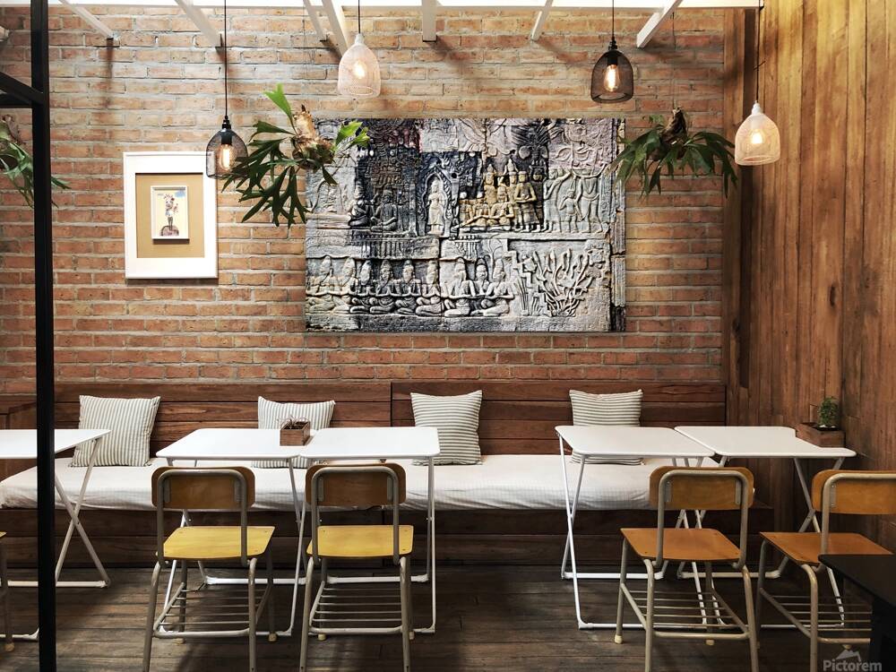 Ancient stone bas reliefs depicting figures and decorative eleme Reproduction