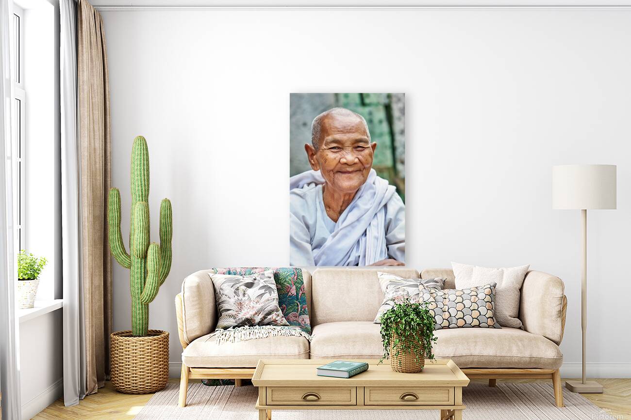 Smiling elderly Asian woman in white robe. Reproduction