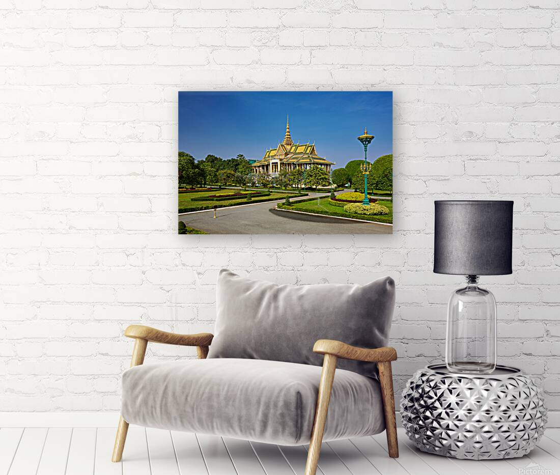 Golden roofed palace in lush gardens Phnom Penh Cambodia. Reproduction