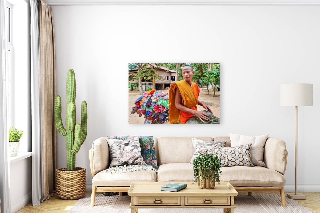 Monk with colorful textiles on a motorcycle. Reproduction