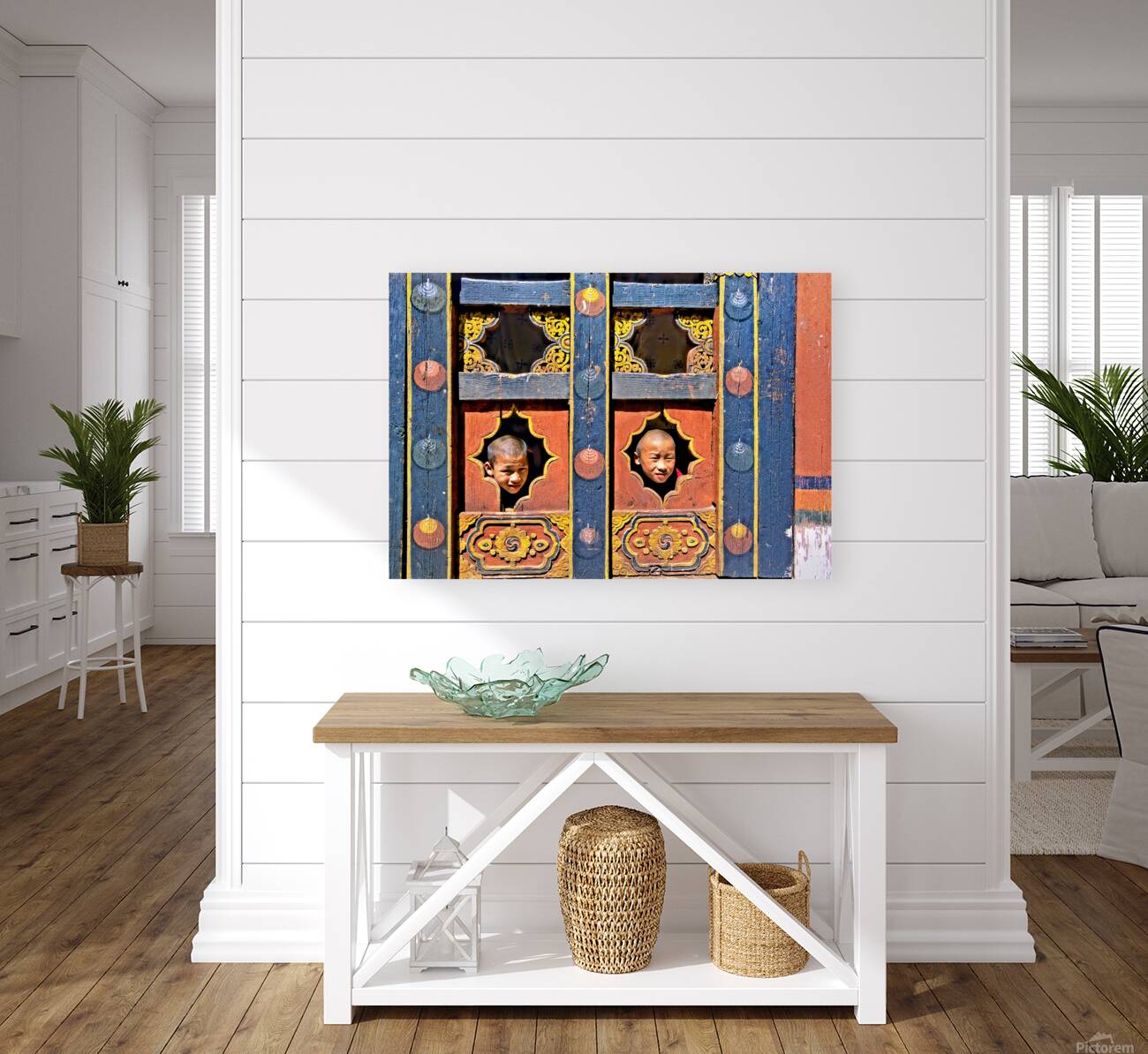 Young monks peeking from decorative colorful windows. Reproduction