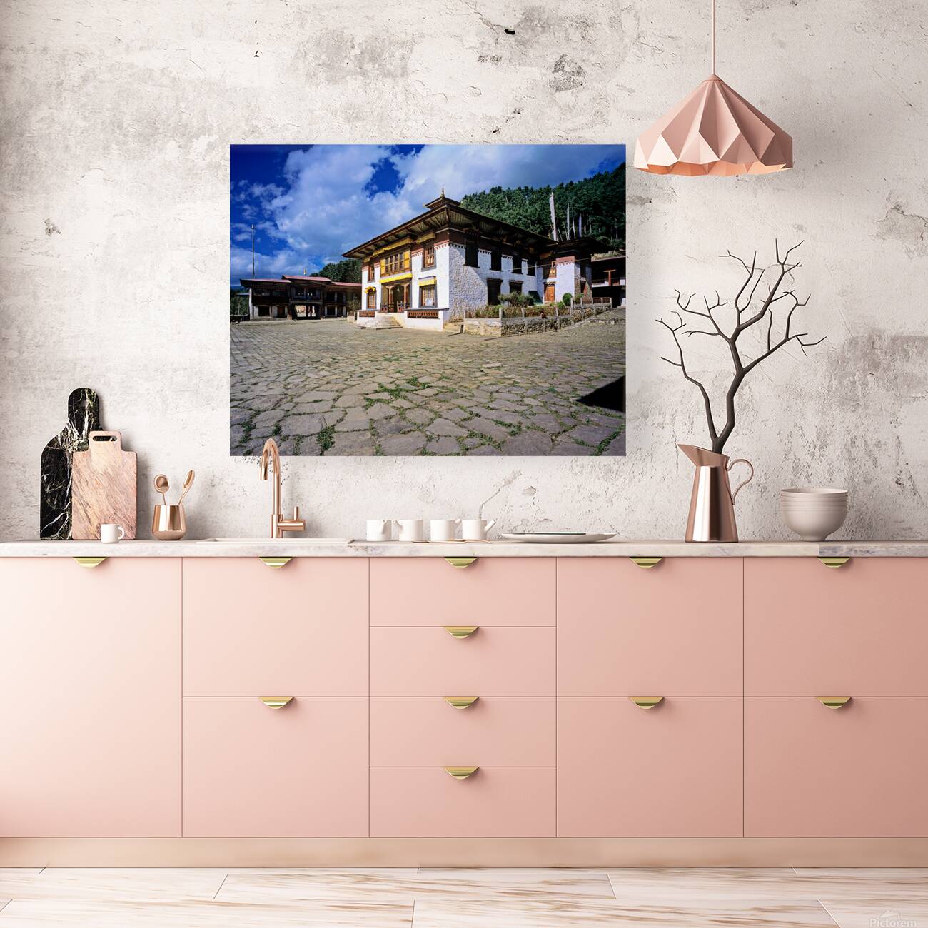 Traditional Bhutanese building with stone courtyard under a clou Reproduction