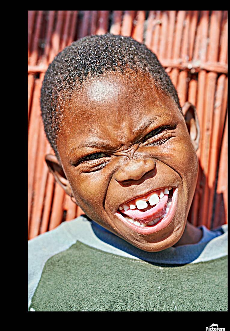 Joyful child smiles in Kavango Region of Namibia Reproduction