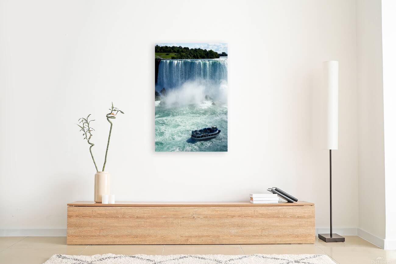 Maid of the Mist boat with tourists at Niagara Falls. Reproduction