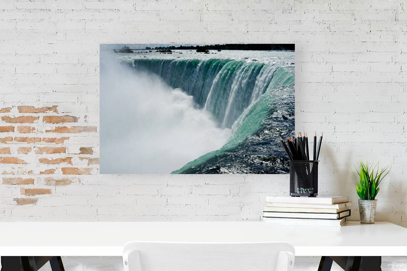 Powerful Niagara Falls cascading creating immense mist. Reproduction