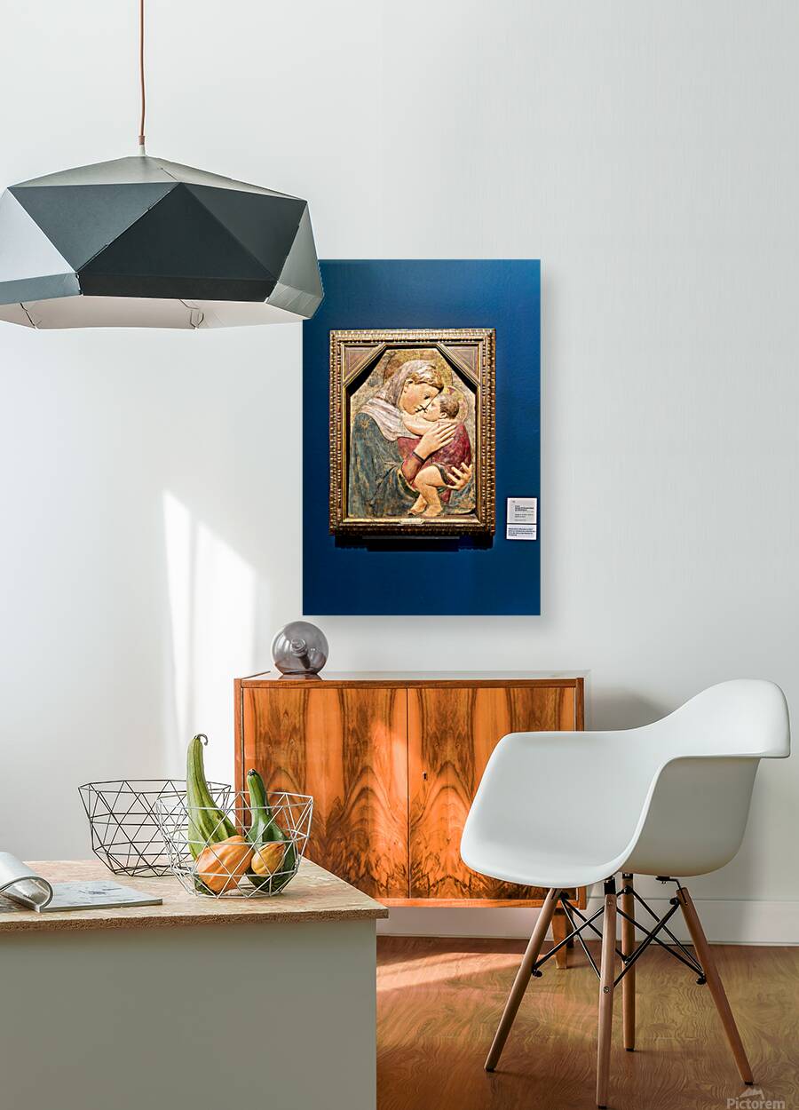 Visitors admire Madonna and Child sculpture by Donatello in muse Reproduction