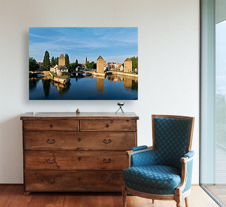Covered bridges in Strasbourg by the river on a clear day Reproduction