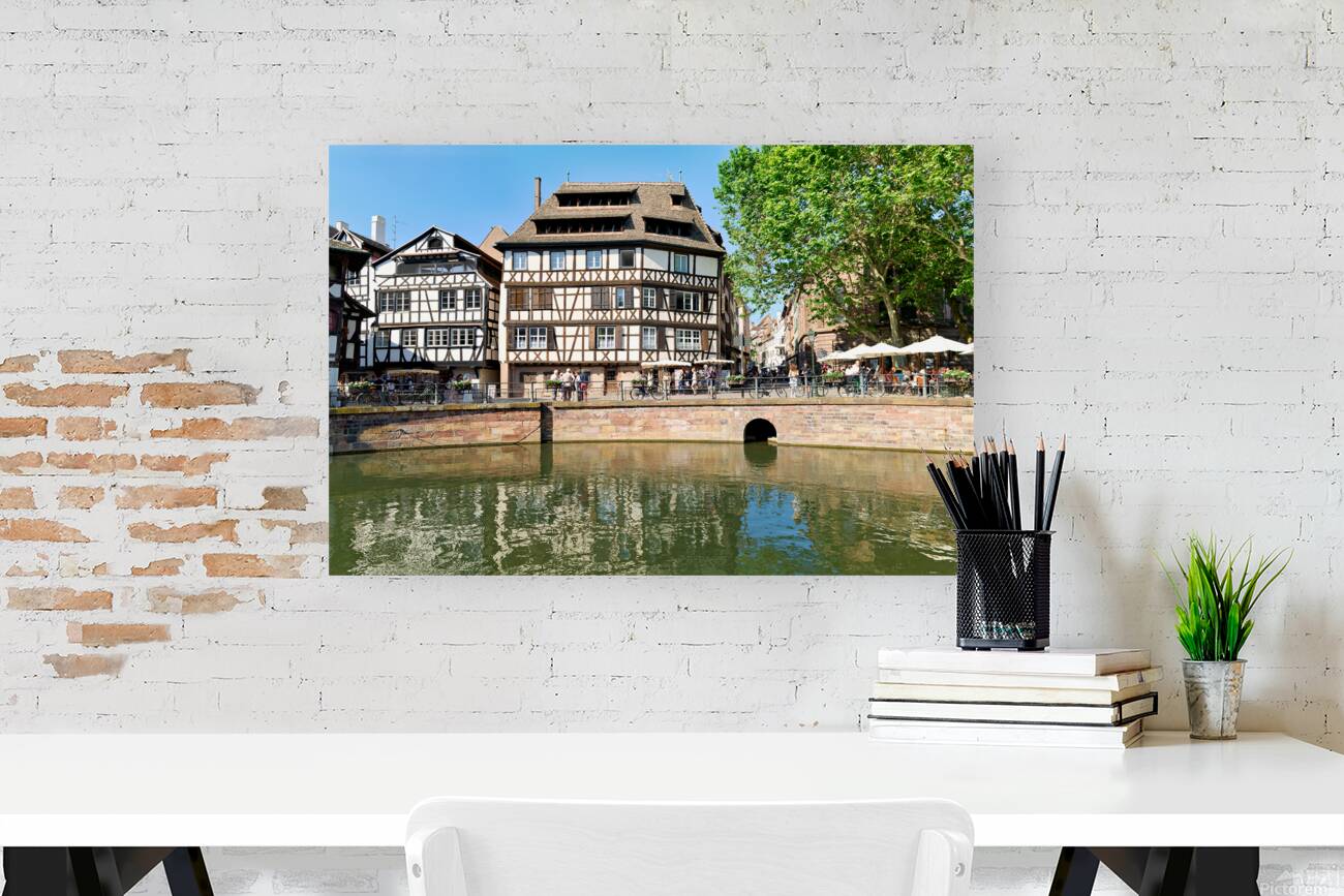 Colored timber houses by the water in Petit France district Reproduction