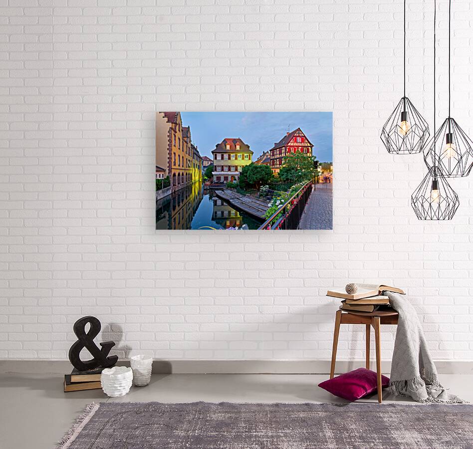 Timber framed houses and visitors in Colmar canals at dusk Reproduction
