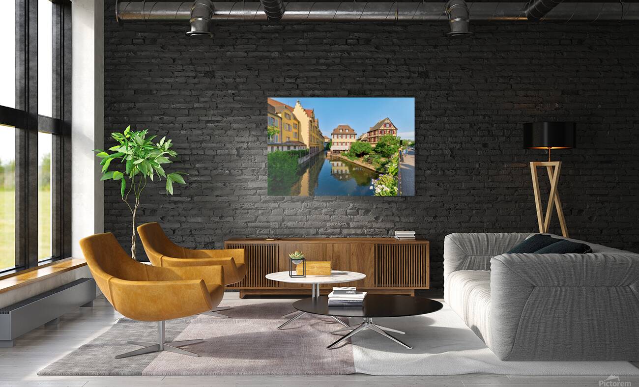 Visitors enjoy sunny day by canals in Colmar France Reproduction