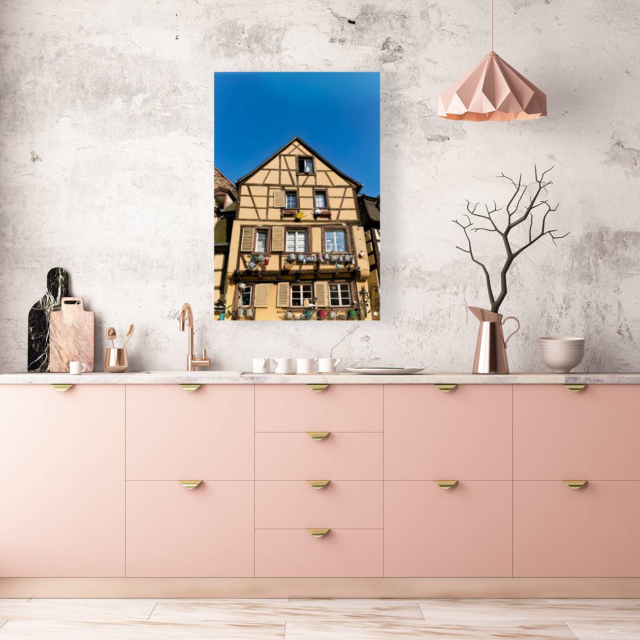 Timber framed houses in Colmar with clear blue sky above Reproduction