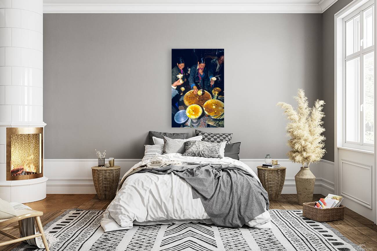 Lighting butter lamps during a ceremony in Tibet Reproduction