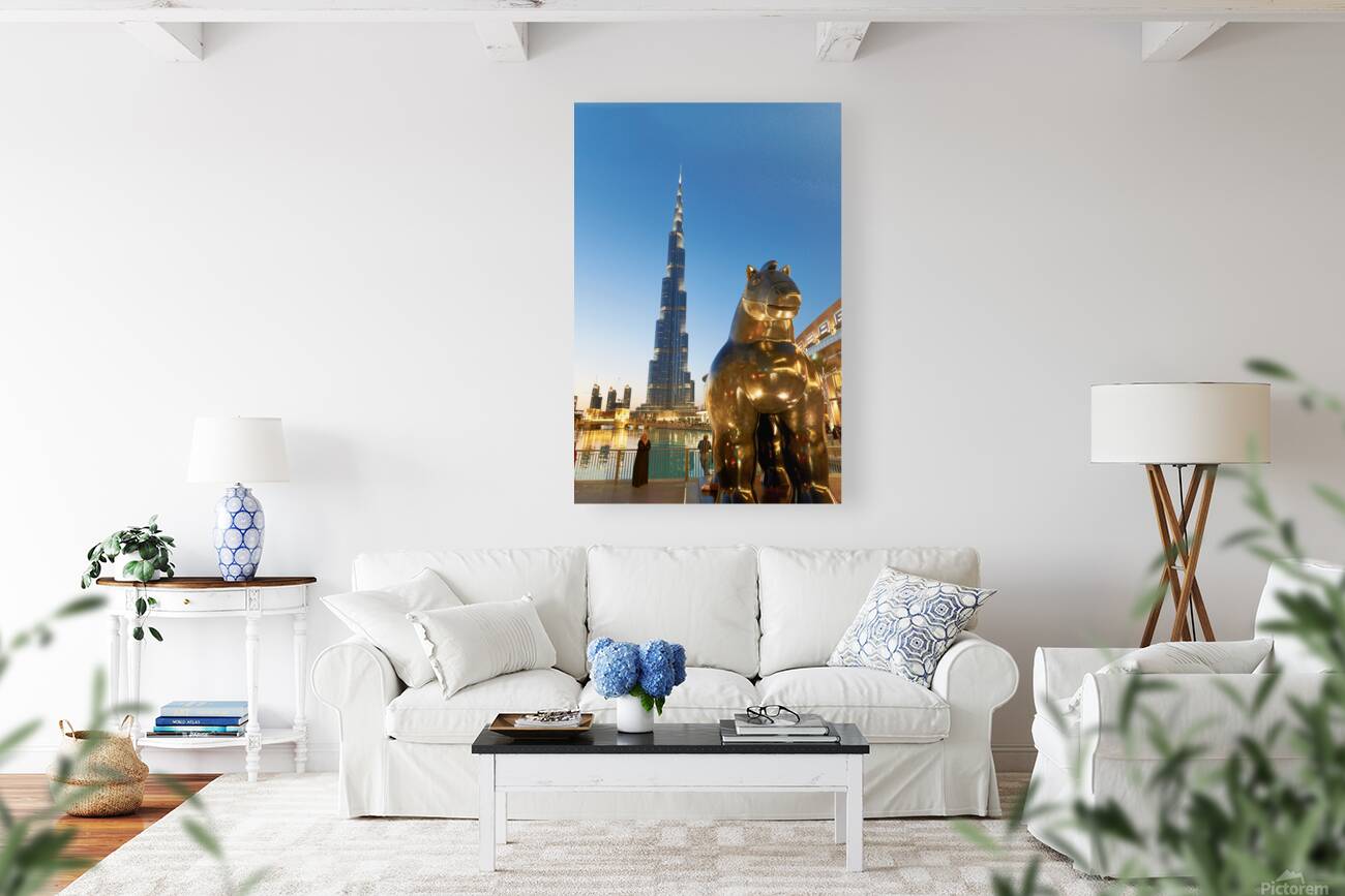 Burj Khalifa and golden horse statue at dusk in Dubai Reproduction