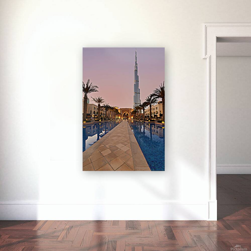 Burj Khalifa towers over pool and traditional buildings in Dubai Reproduction