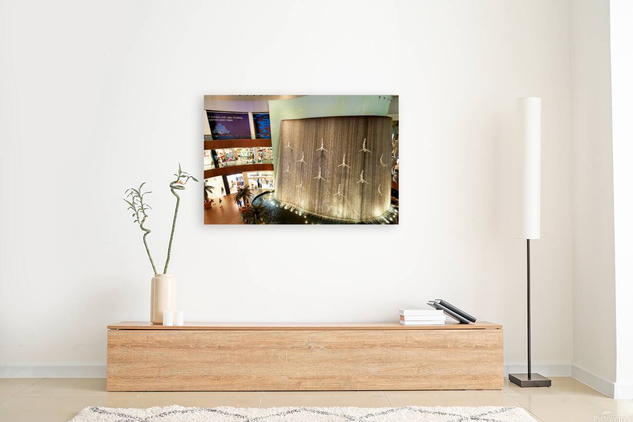 Indoor waterfall with diver sculptures in a mall in Dubai UAE Reproduction