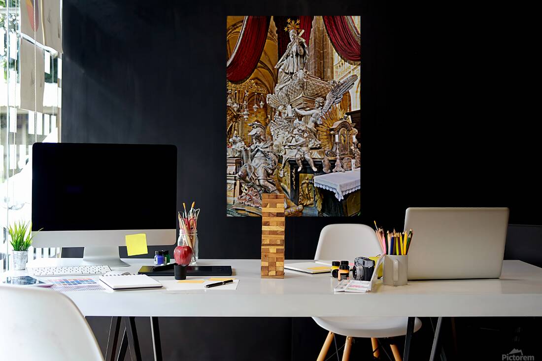 Ornate silver religious monument inside a grand cathedral. Reproduction