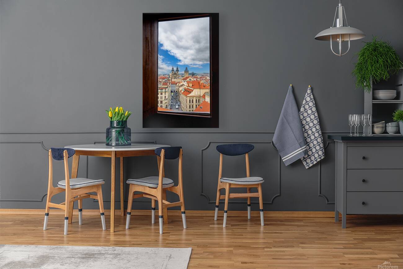 Prague cityscape from window Tyn Church red roofs. Reproduction