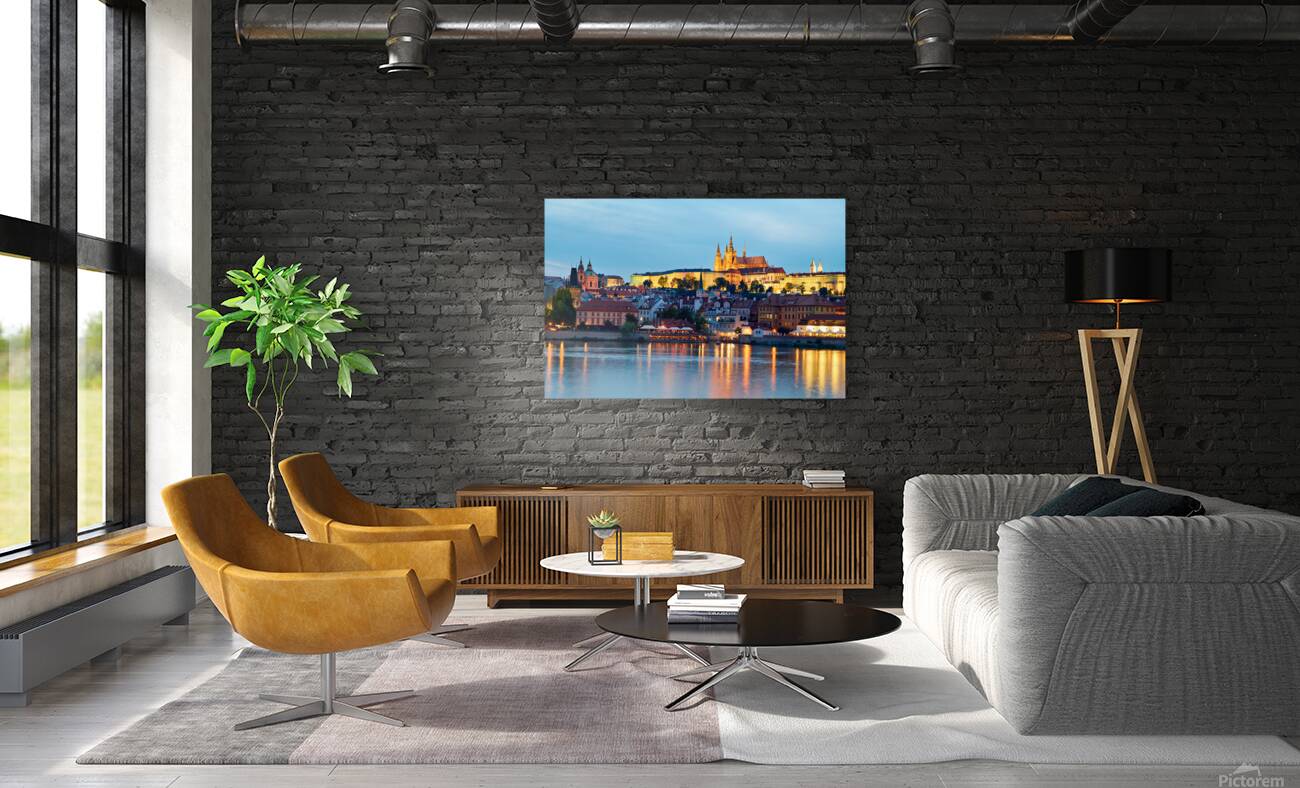 Prague cityscape at night with castle and river reflections. Reproduction