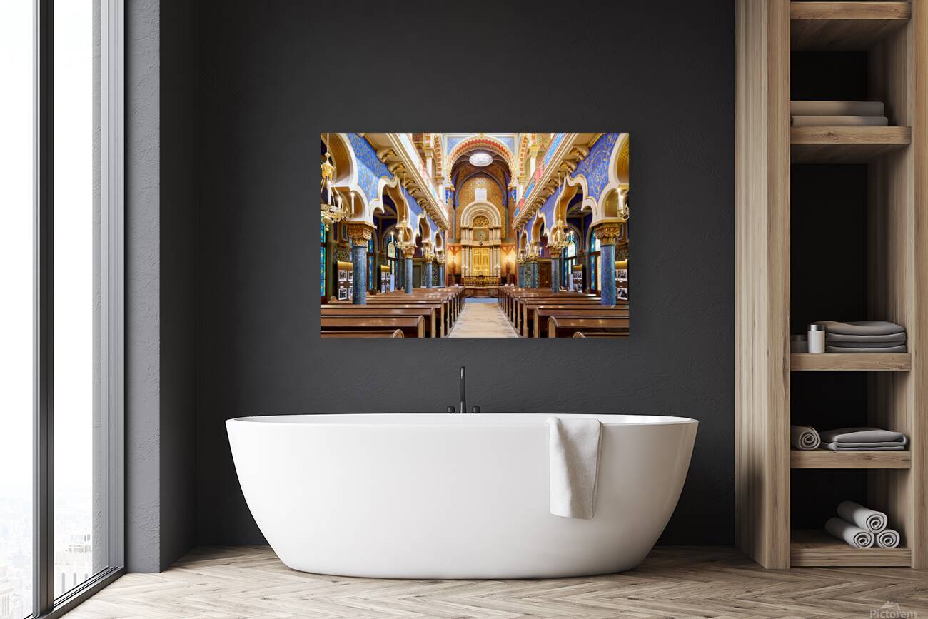 Grand ornate synagogue interior featuring golden ark and pews. Reproduction
