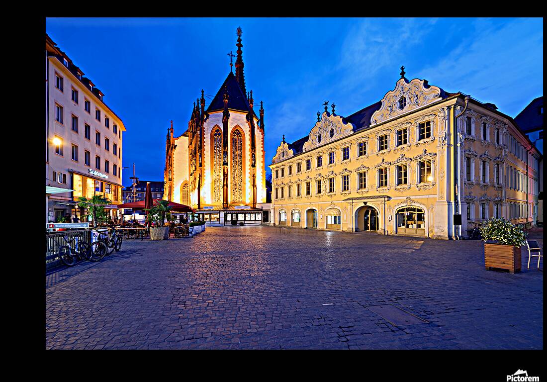 Wurzburg at dusk with Marienkapelle and Falcon House in view Reproduction