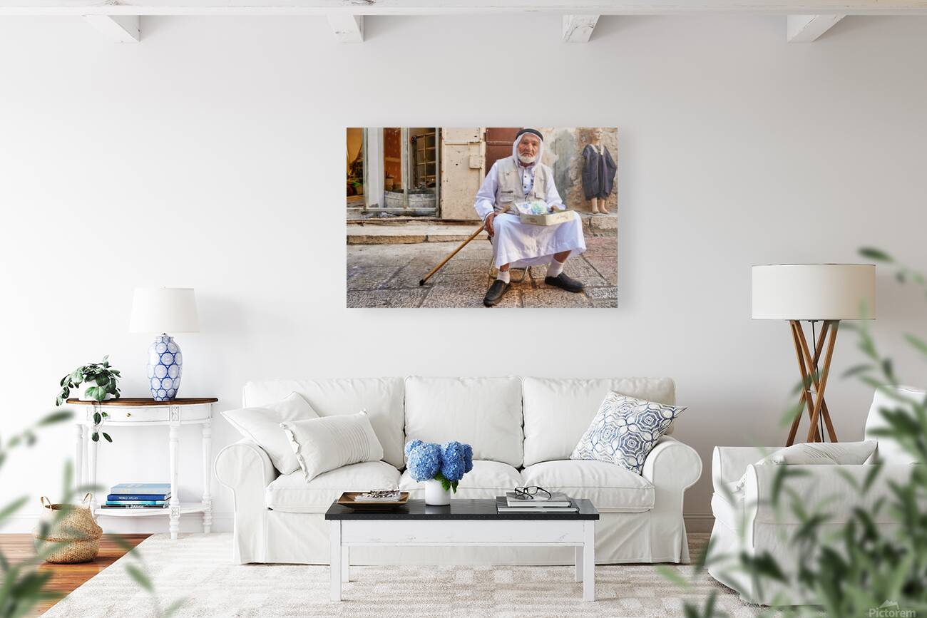 Old man sits in the old city of Jerusalem asking for help Reproduction