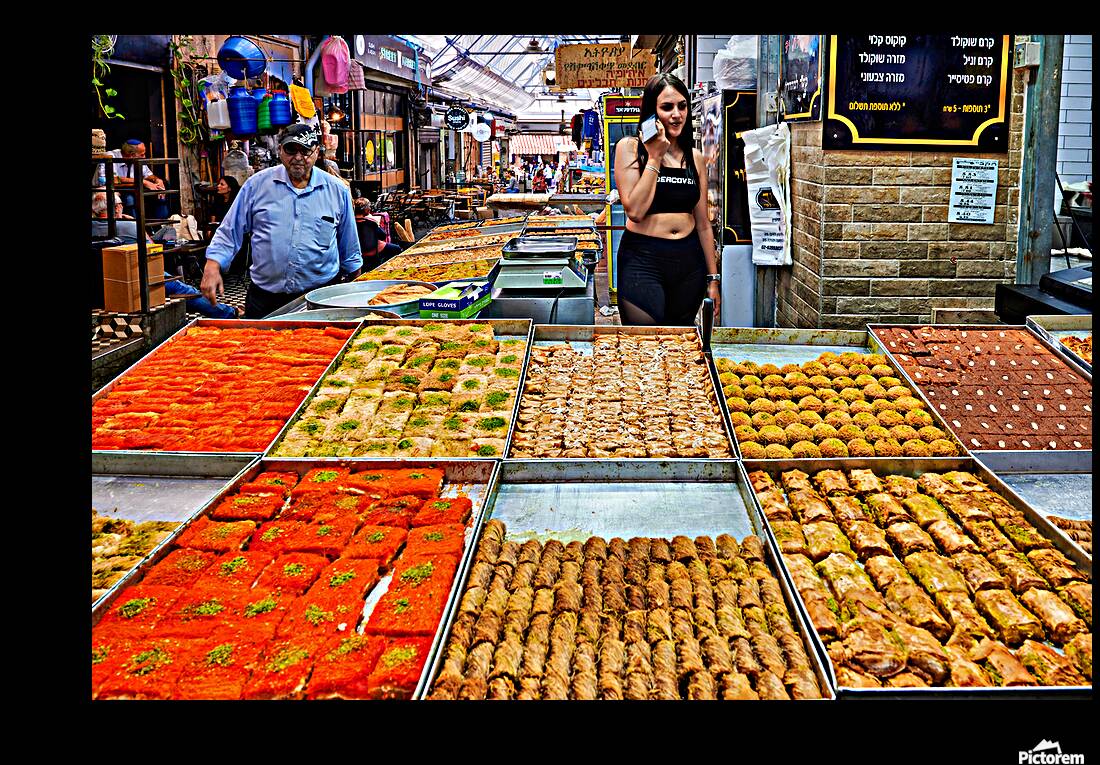 Visitors explore food stands at Mahane Yehuda Market in Jerusale Reproduction