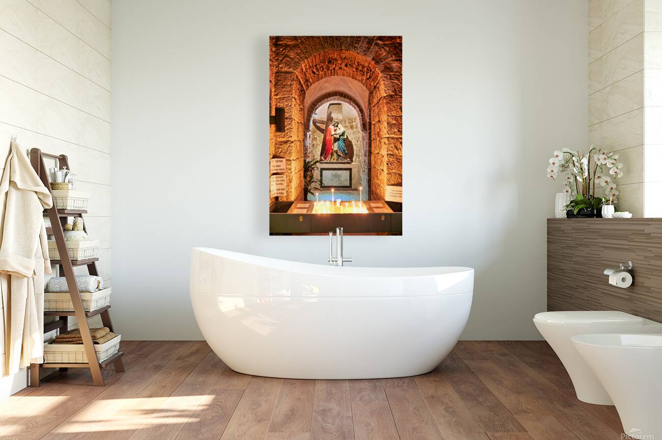 Statue of Mary and Jesus in a chapel with candles Reproduction