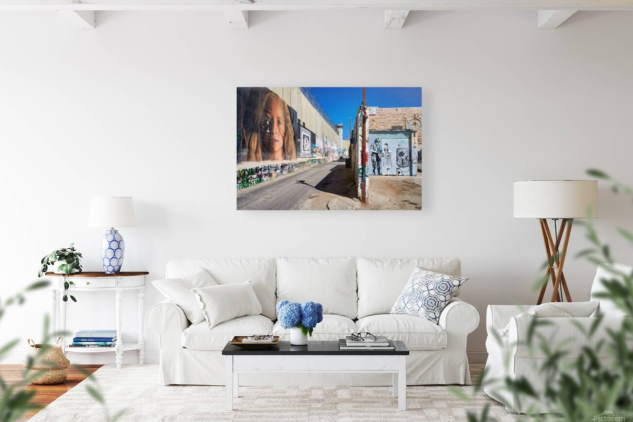 West Bank separation wall in Bethlehem shows murals and artwork Reproduction