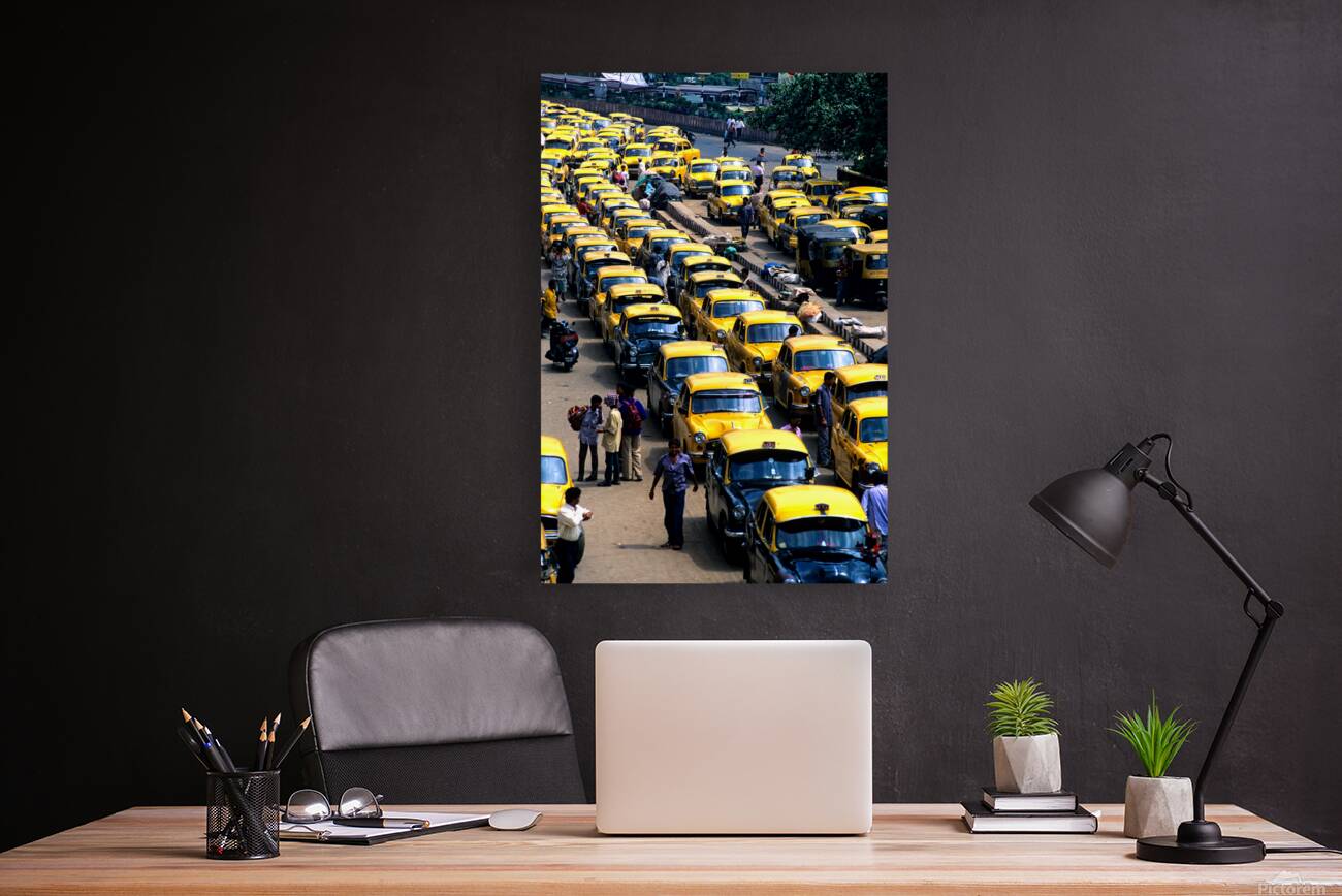 Taxi parking in Kolkatas busy streets during daytime Reproduction