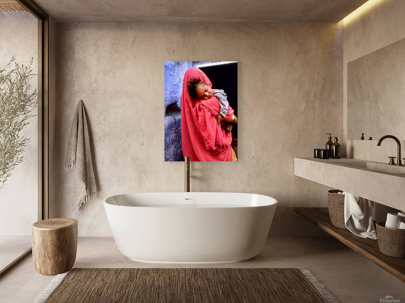 Mother carries sleeping child in India during daytime Reproduction