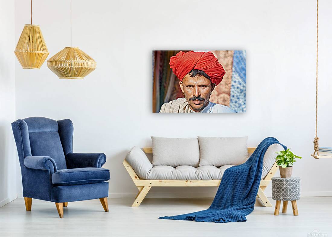 Man in red turban poses in Rajasthans Jaisalmer market street Reproduction