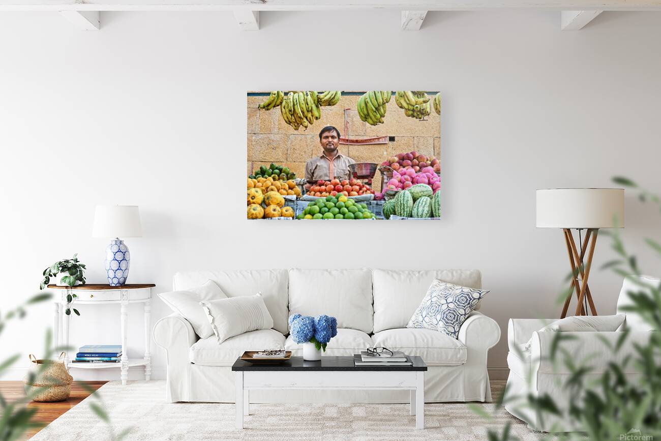 Fruits and vegetables stall in Jaisalmer with vendor at work Reproduction
