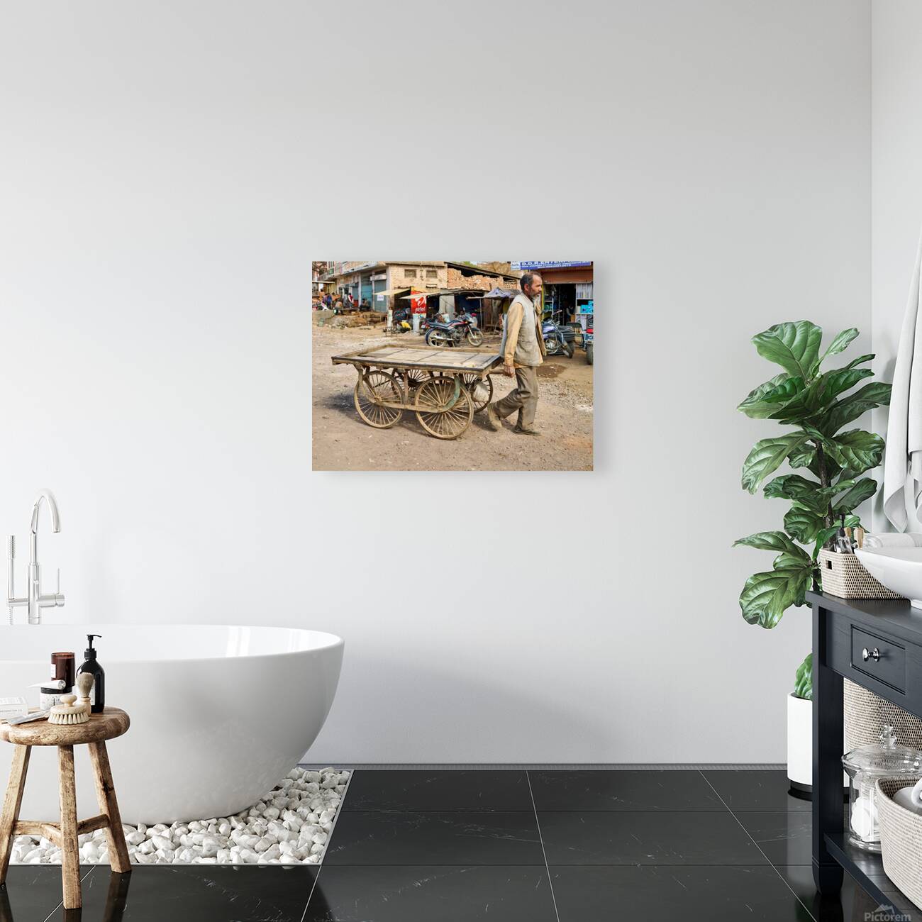 Man pulls an empty cart in Orchha Madhya Pradesh India Reproduction