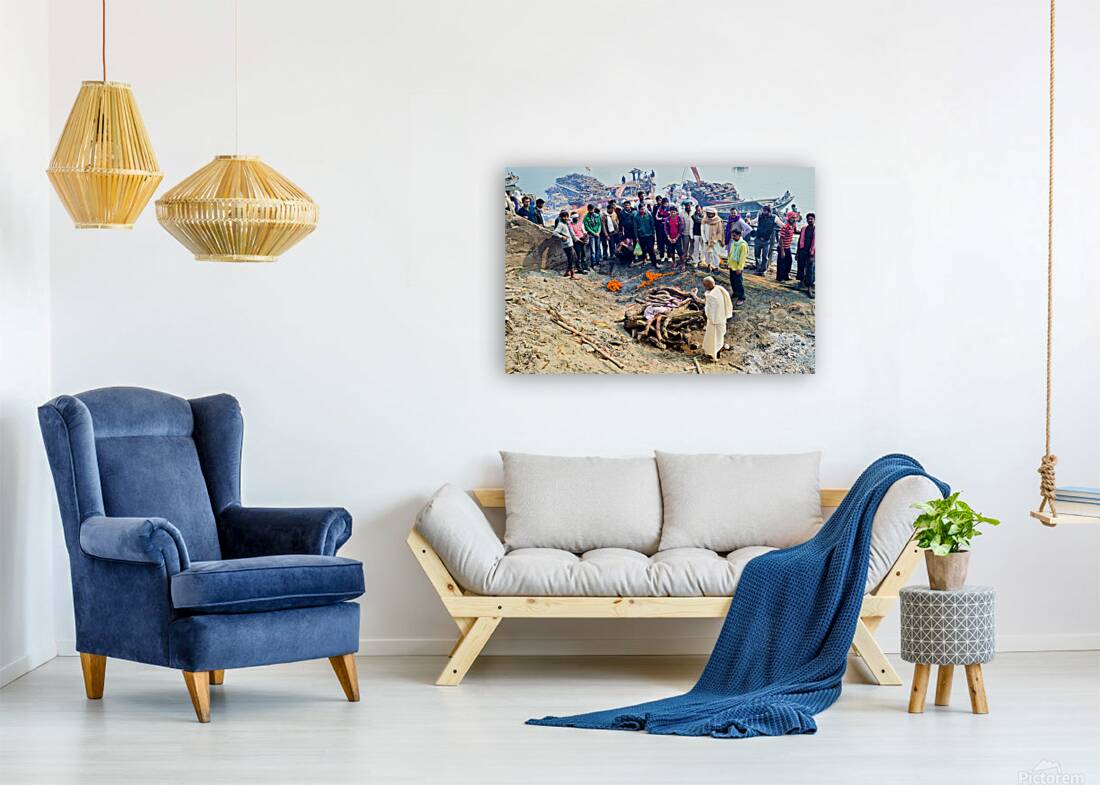 Cremation rites by the Ganges River in Varanasi India Reproduction