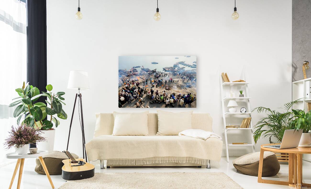 Cremation rites by the river Ganges in Varanasi India Reproduction