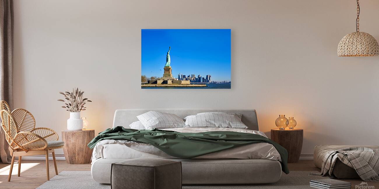 Statue of Liberty stands tall on Liberty Island in New York City Reproduction