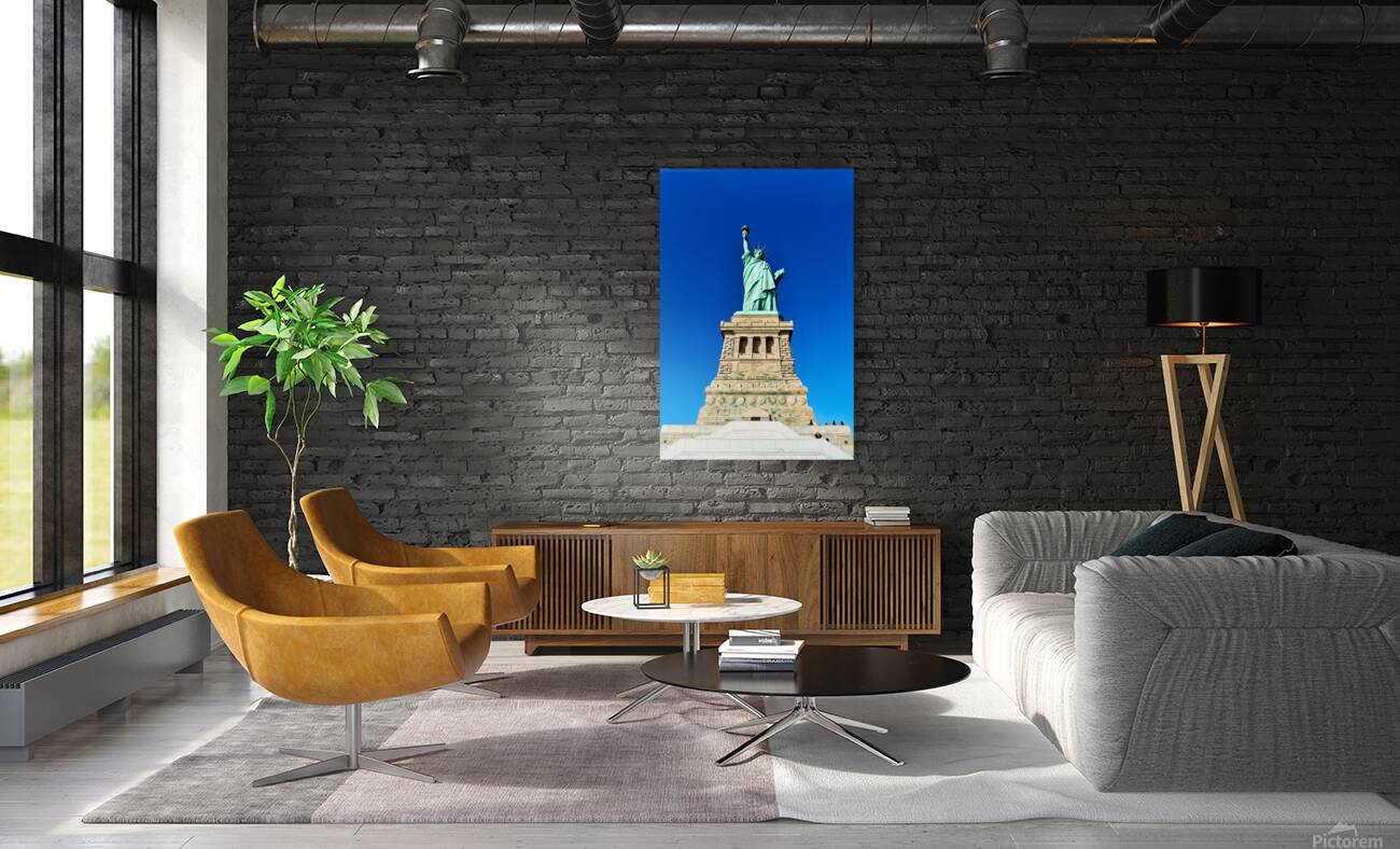Statue of Liberty stands proudly on Liberty Island in Manhattan Reproduction