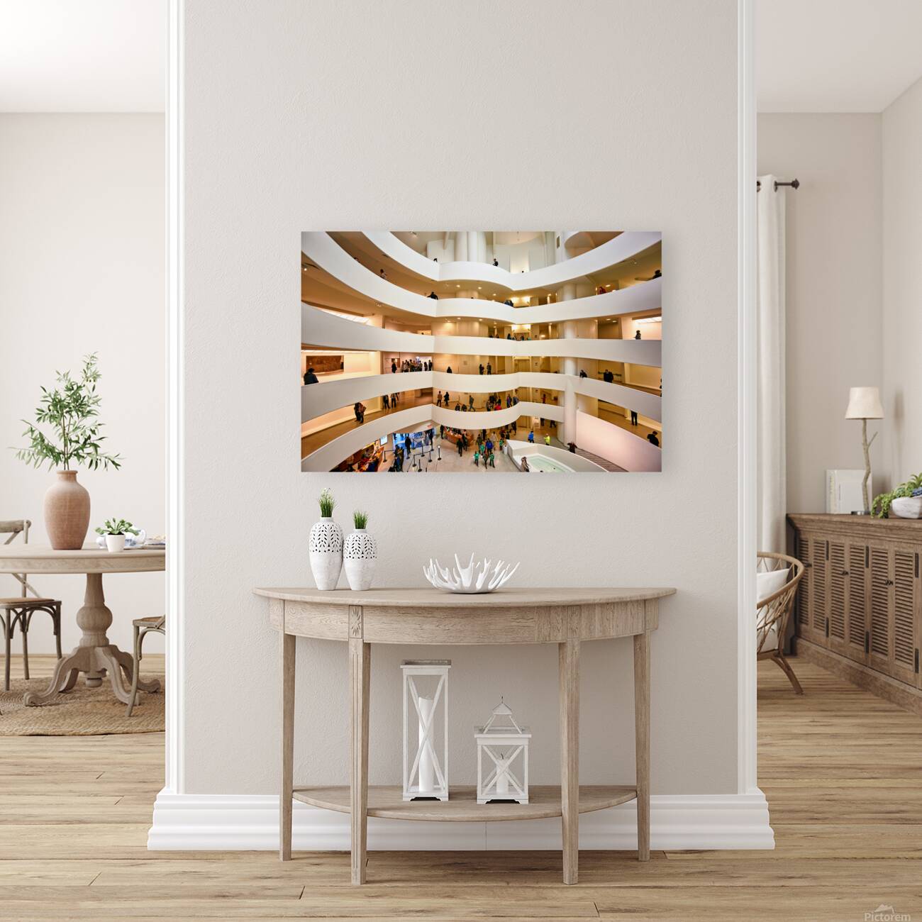 People walk and observe art in the Solomon R Reproduction