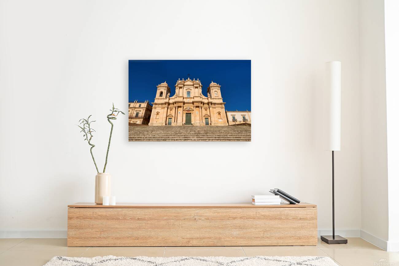 Noto Cathedral stands tall in Sicily under a clear blue sky Reproduction