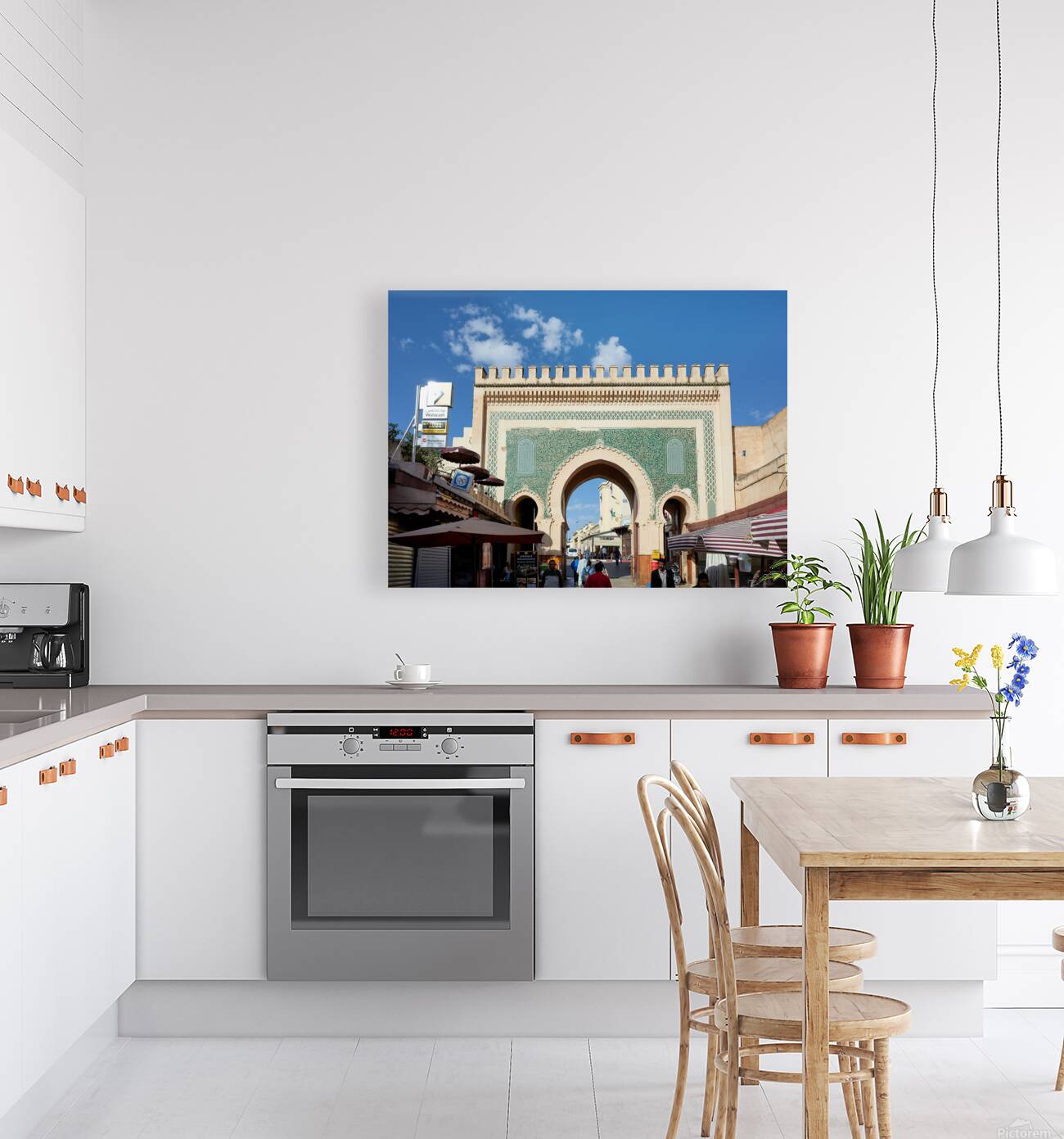 People walk through Bab Bou Jeloud a famous gate in Fez Morocc Reproduction