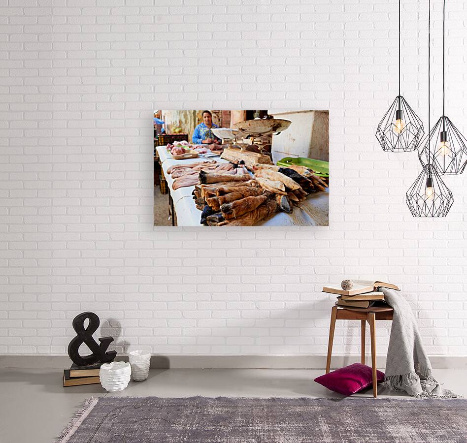 Butcher working in Meknes souk with various cuts of meat Reproduction