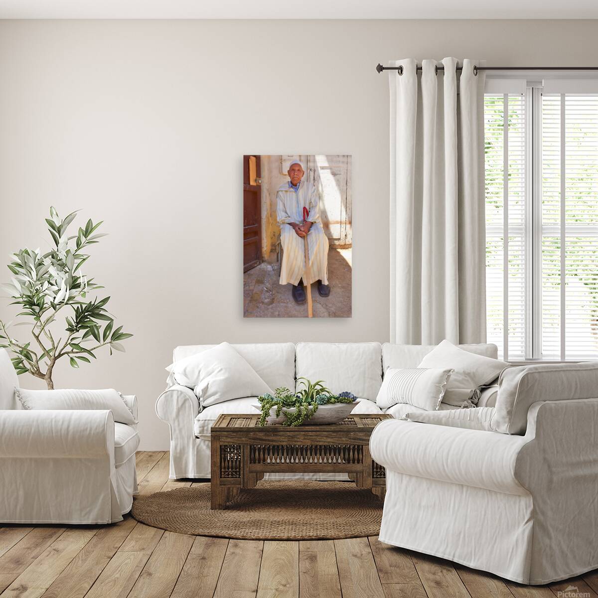 Old man sitting in Meknes Morocco in daylight Reproduction