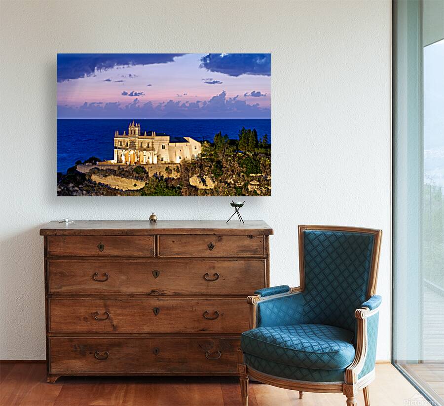 Tropea offers views of the sea and buildings at sunset in Calabr Reproduction