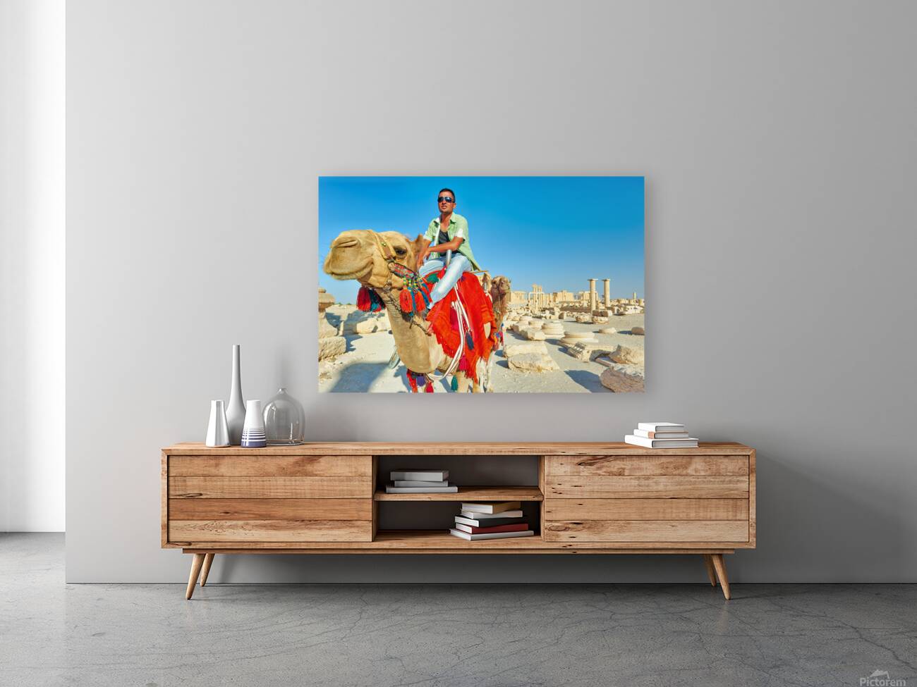 Camel driver in ancient Palmyra leading a tourist ride Reproduction